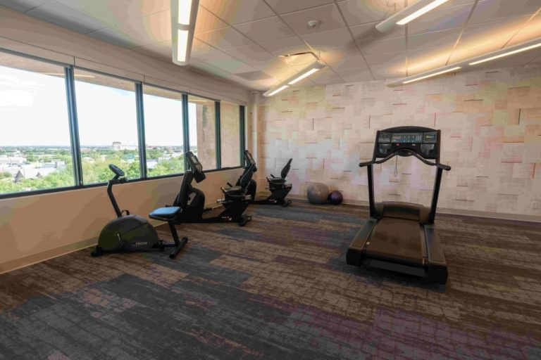 gym with treadmill and exercise equipment