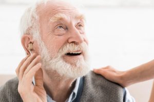 an elderly man looking up at someone thinking about how respite care works
