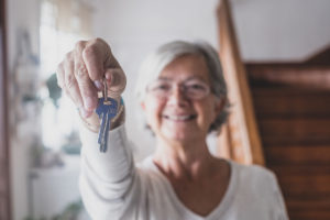 Woman learning difference between senior apartments vs independent living