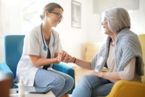 Doctor talks to senior about medication management for seniors 