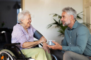Two people chat and discuss the average age for assisted living