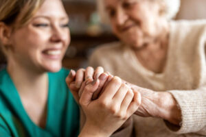 Respite care worker and senior connect as they discover the benefits of respite care