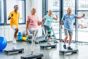 Seniors work out as they discover the importance of wellness programs in senior living